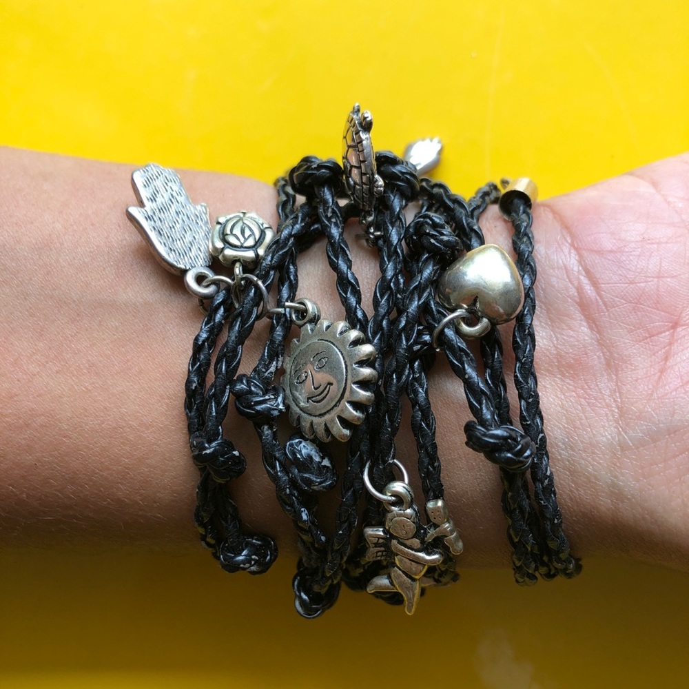 Black leather cord with silver charms